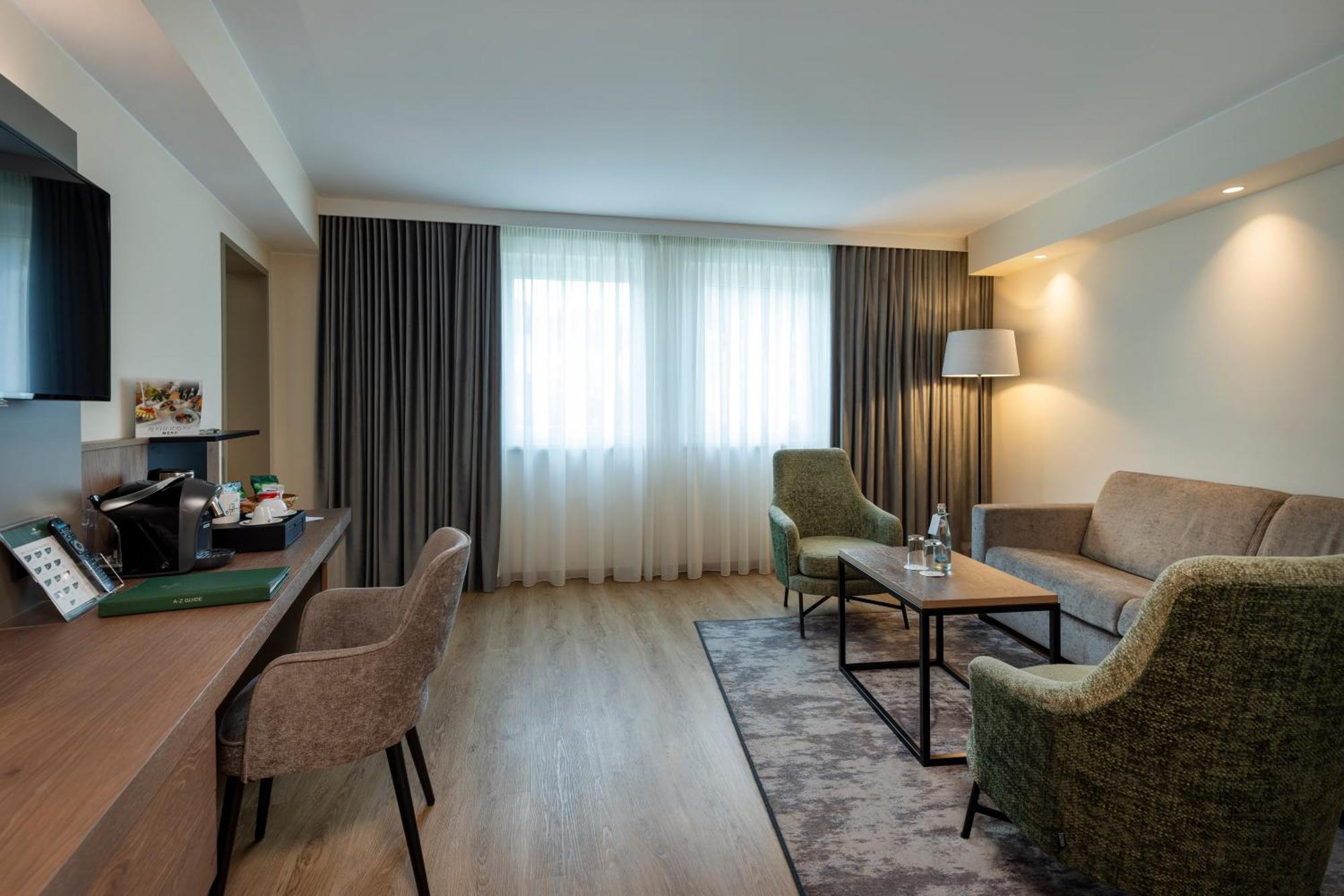 Rogner Hotel Tirana Exterior photo Suite