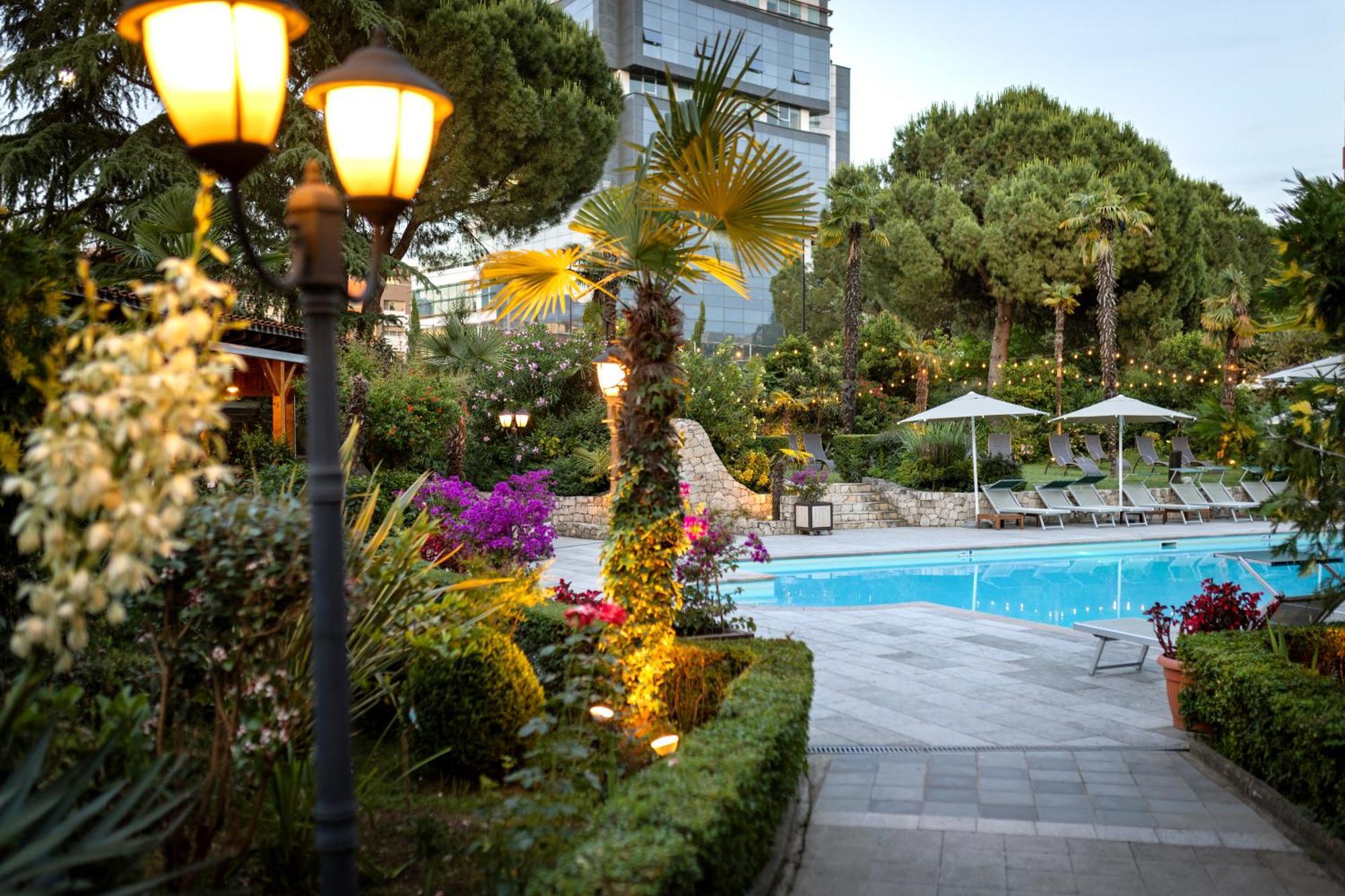 Rogner Hotel Tirana Exterior photo The pool at the hotel