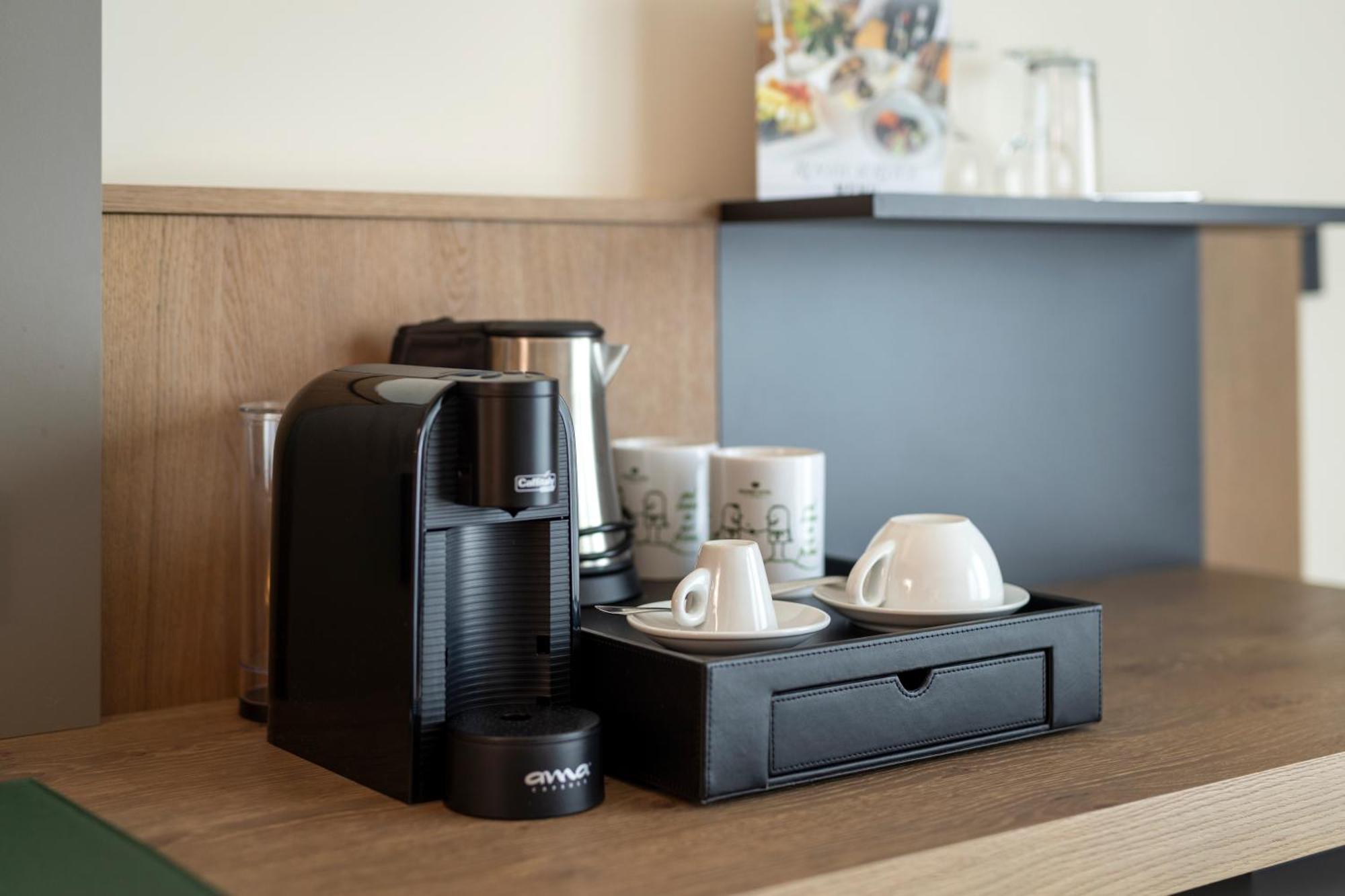 Rogner Hotel Tirana Room photo A Nespresso coffee machine