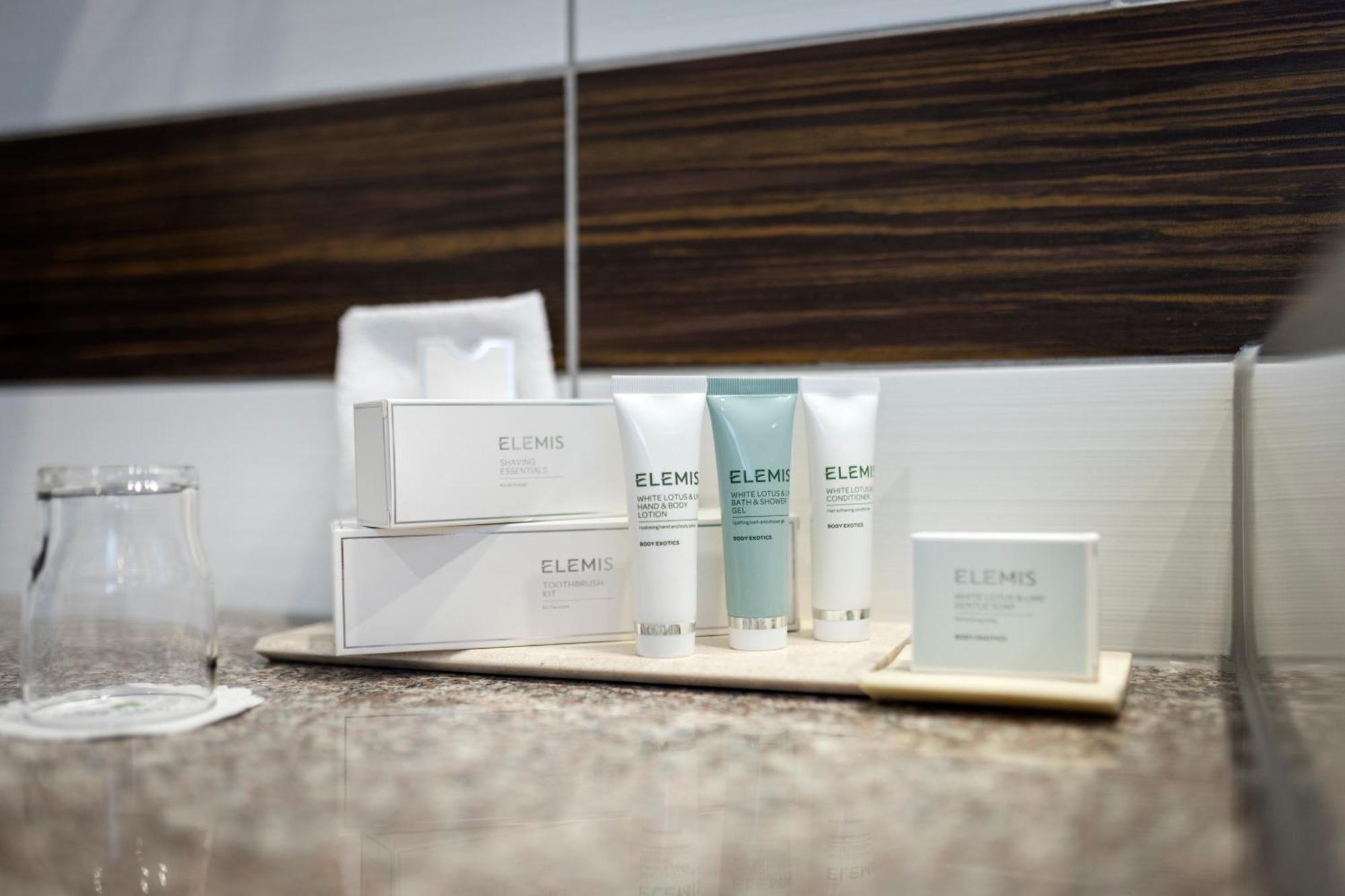 Rogner Hotel Tirana Room photo A selection of Elemis products